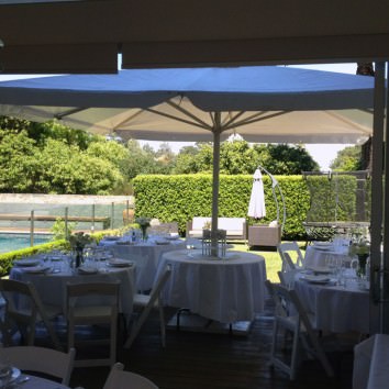 Round table settings with Italian folding chairs